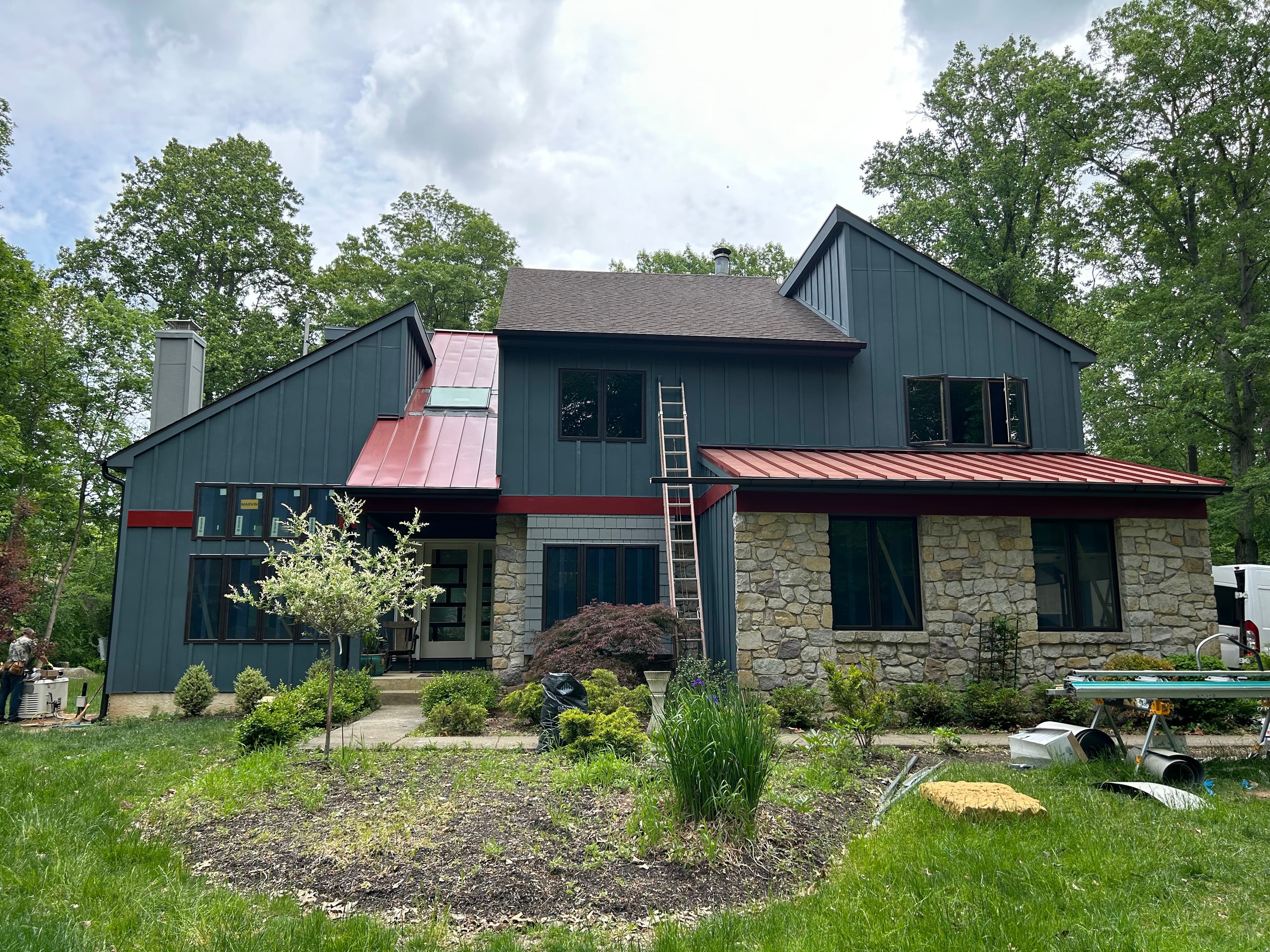 Detail view of replicated period trim profiles in primed cellular PVC and new copper flashing.